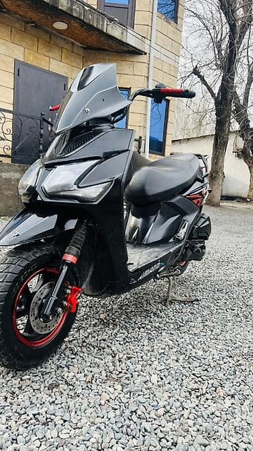 скутер мотоциклы: Скутер AIMANO в черном цвете с агрессивным дизайном. Модель оснащена — 1