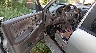 кондидер: Mazda 626: 2000 г., 1.8 л, Механика, Бензин, Седан — 5