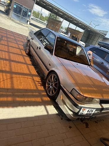 паук бмв: Mazda 626: 1988 г., 0.2 л, Механика, Бензин, Седан — 1