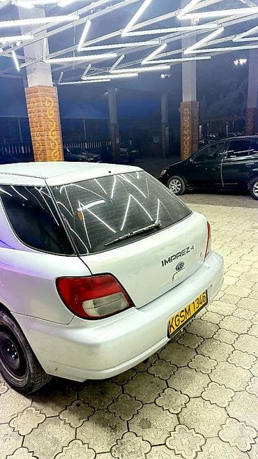 matiz diska: Subaru Impreza: 2002 г., 2.5 л, Автомат, Бензин, Универсал — 4