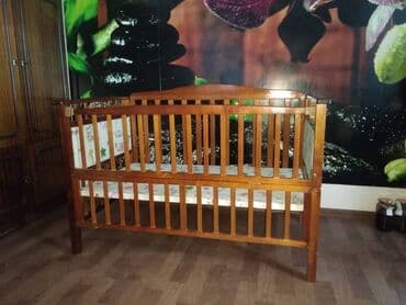 Детская кроватка-манеж