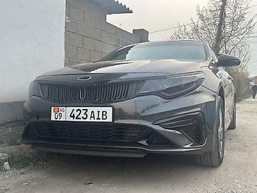 программатор ключей: Седан бизнес-класса темно‑серого цвета с агрессивным спортивным — 2