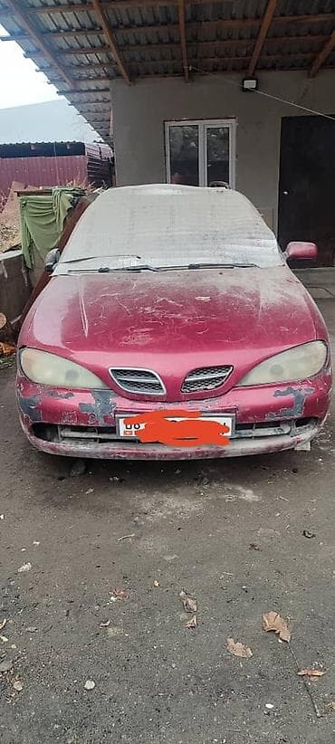 Mazda 323: 2001 г., 1.8 л, Механика, Бензин, Универсал