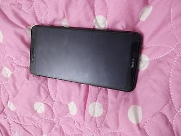 bos mini: Redmi, Redmi 7A, Б/у, 32 ГБ, цвет - Черный — 1