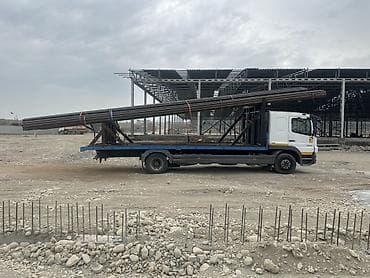 Услуги: Услуга: Доставка длинномерных грузов (трубы, балки, профили — 1