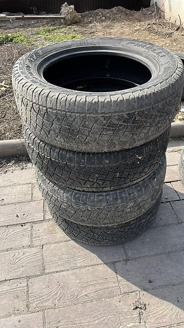 Колпаки: Шины 275 / 55 / R 20, Всесезонная, Комплект, Внедорожные (АТ/МТ), Pirelli — 1