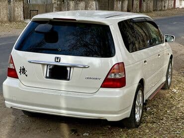 обмен на авто с доплатой: Honda Odyssey: 2002 г., 2.3 л, Автомат, Бензиновая, Минивэн — 10