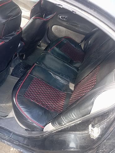 обшивка мазда: Чехлы Экокожа, цвет - Черный, Daewoo — 1