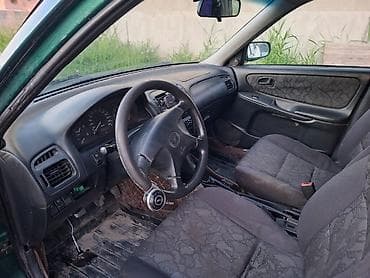 Mazda: Mazda 626: 1999 г., 1.8 л, Механика, Бензин, Универсал — 7