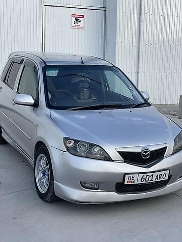 Mazda Demio: 2003 г., 1.5 л, Автомат, Бензин, Хэтчбэк