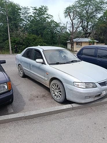 Mazda 626: 2001 г., 1.8 л, Механика, Бензин, Седан