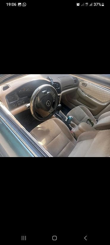 Mazda 626: 1999 г., 2 л, Автомат, Бензин, Седан
