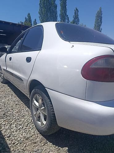 Унаа: Daewoo Lanos: 1999 г., 1.5 л, Кол менен иштөөчү, Бензин, Седан — 2