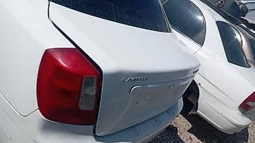 Унаа тетиктери: Багажниктин капкагы Daewoo, Оригинал — 2