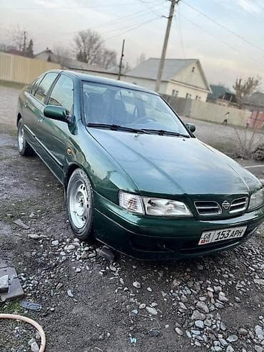 opel record: Nissan Primera: 1998 г., Бензин, Седан — 5