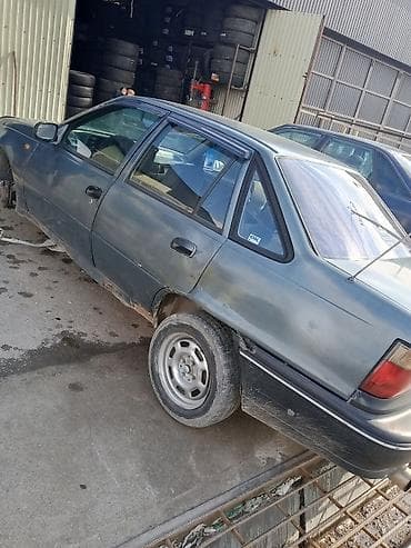 bmw 525 e34: Daewoo Nexia: 1999 г., Механика, Бензин, Седан — 3