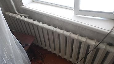 Продаются чугунные батареи 2 шт 15 и 20 секционные — 2