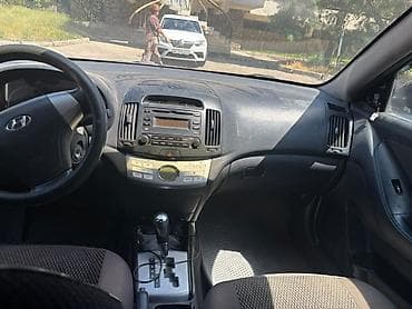 byd e7: Hyundai Elantra: 2010 г., 1.6 л, Автомат, Бензин, Седан — 5