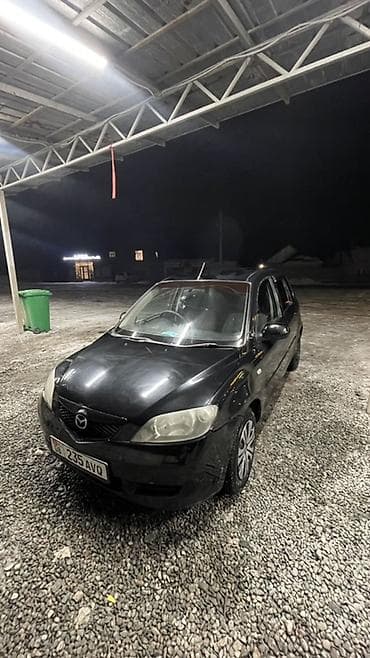 mini cuper: Mazda Demio: 2005 г., 1.3 л, Автомат, Бензин, Хэтчбэк — 1