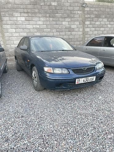 Mazda 626: 1997 г., 1.8 л, Механика, Бензин, Седан