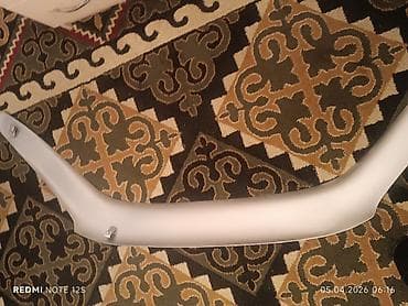 step 2: Накладка на бампер Toyota, Новый, Оригинал — 1