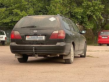 195 60 14: Nissan Wingroad: 2000 г., 2 л, Автомат, Бензин, Универсал — 1