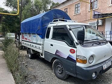 ручной машина: Hyundai Porter — компактный бортовой грузовик с тентованным кузовом — 4