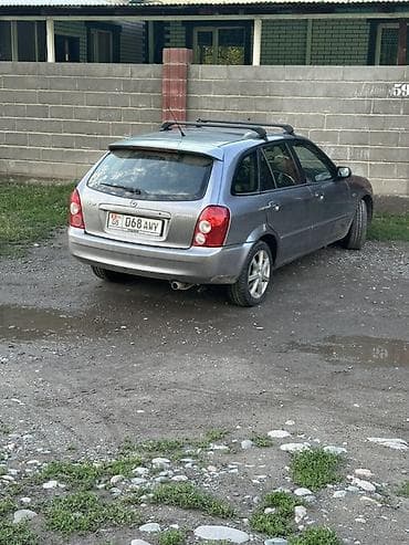 аварийном матиз: Mazda 323: 2003 г., 1.6 л, Автомат, Бензин, Хэтчбэк — 1