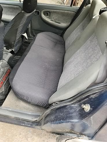 Унаа: Daewoo Nexia: 2006 г., Кол менен иштөөчү, Бензин, Седан — 5