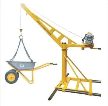 подъёмник на сто: Электрическая лебедка с красным корпусом и серым двигателем — 5