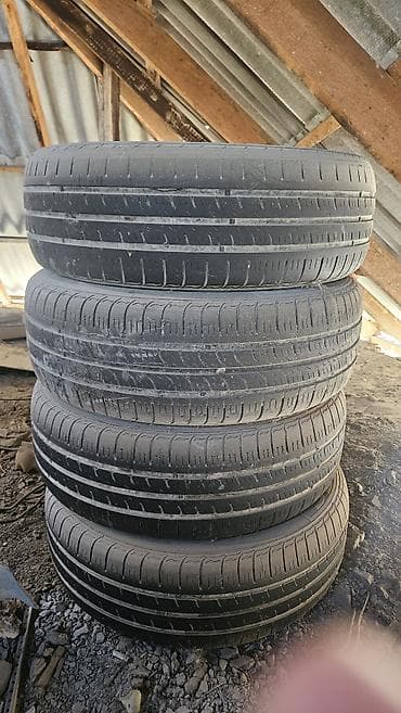 ф 90: Шины 205 / 65 / R 15, Лето, Комплект, Легковые, Kumho — 1