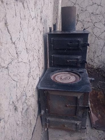 стол с зеркалом: Металлическая печь с варочной поверхностью — 1