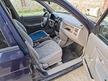 сары булун: Mazda Demio: 2002 г., 1.3 л, Кол менен иштөөчү, Бензин, Хетчбек — 9