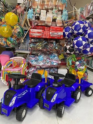 вещи каракол: Детский трактор-каталка электрический с прицепом, с музыкой синего — 1