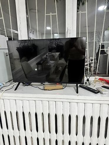 ТВ жана Видео: Смарт Телевизор VISION, диагональ экрана около 32–40 дюймов (оценочно — 1