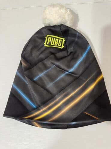 пистолет стреляет орбизами: Зимняя шапка унисекс, выполненная в черном цвете с ярким принтом — 1