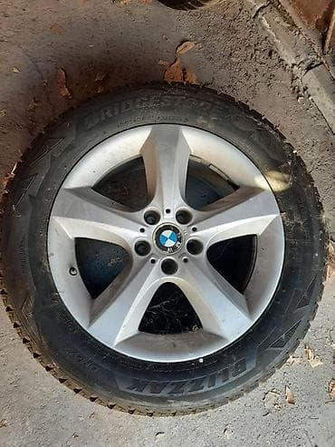 55: Комплект зимних шин Bridgestone Blizzak на легкосплавных дисках BMW — 1