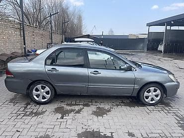 мицубиши лансер: Mitsubishi Lancer: 2005 г., 1.6 л, Автомат, Бензин, Седан — 6