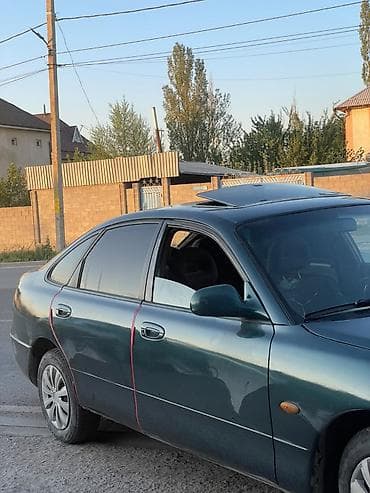 машина салон: Mazda 626: 1999 г., Механика, Седан — 1
