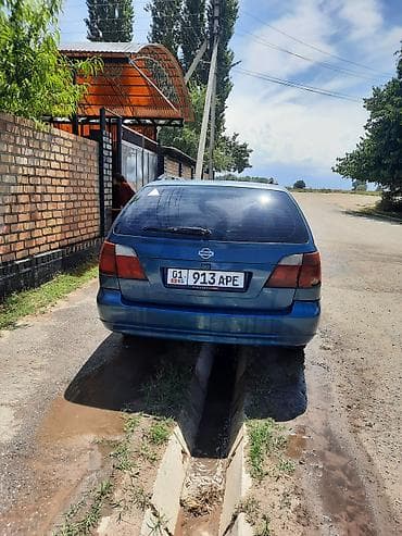 genesis 80: Nissan Primera: 2001 г., Универсал — 5