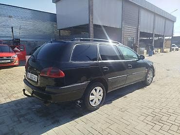 королла 1 6: Toyota Avensis: 2003 г., Универсал — 4