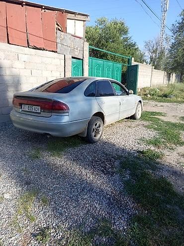 Унаа: Mazda 626: 1992 г., Кол менен иштөөчү, Седан — 1