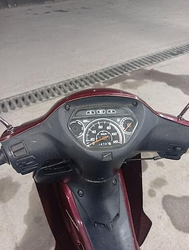 dio 27: Honda Wave — экономичный и практичный мопед (underbone) в бордовом — 3