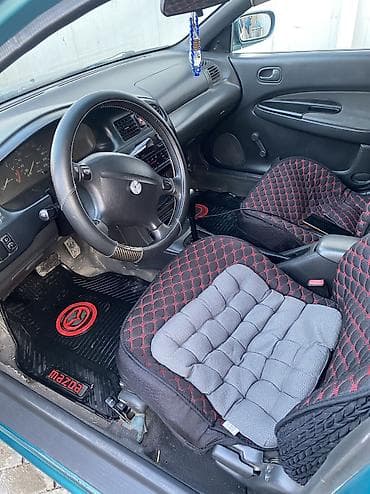 rx 590: Mazda 323: 1996 г., 1.6 л, Автомат, Газ, Седан — 10