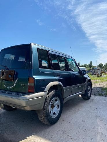 сары булун: Suzuki Escudo: 1996 г., 2 л, Автомат, Бензин, Жол тандабас — 6