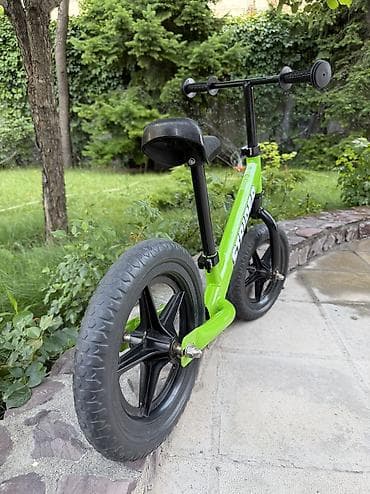 Детский транспорт: Беговел Strider, зеленый. Состояние новое, ребенок не заинтересовался — 6