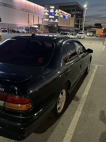 справа: Nissan Cefiro: 1996 г., 2 л, Бензин, Седан — 4