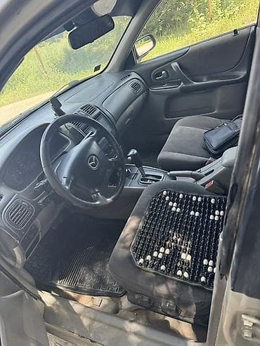 Продажа авто: Mazda 323: 2002 г., 1.6 л, Автомат, Бензин, Седан — 4