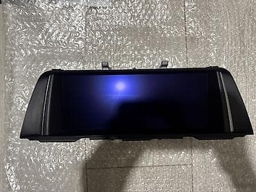 Дисплей BMW Ф10 6 Есть горизонтальная царапина, на фото видно. На