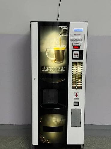 Торговый автомат для горячих напитков (кофе/эспрессо). Особенности: - — 2